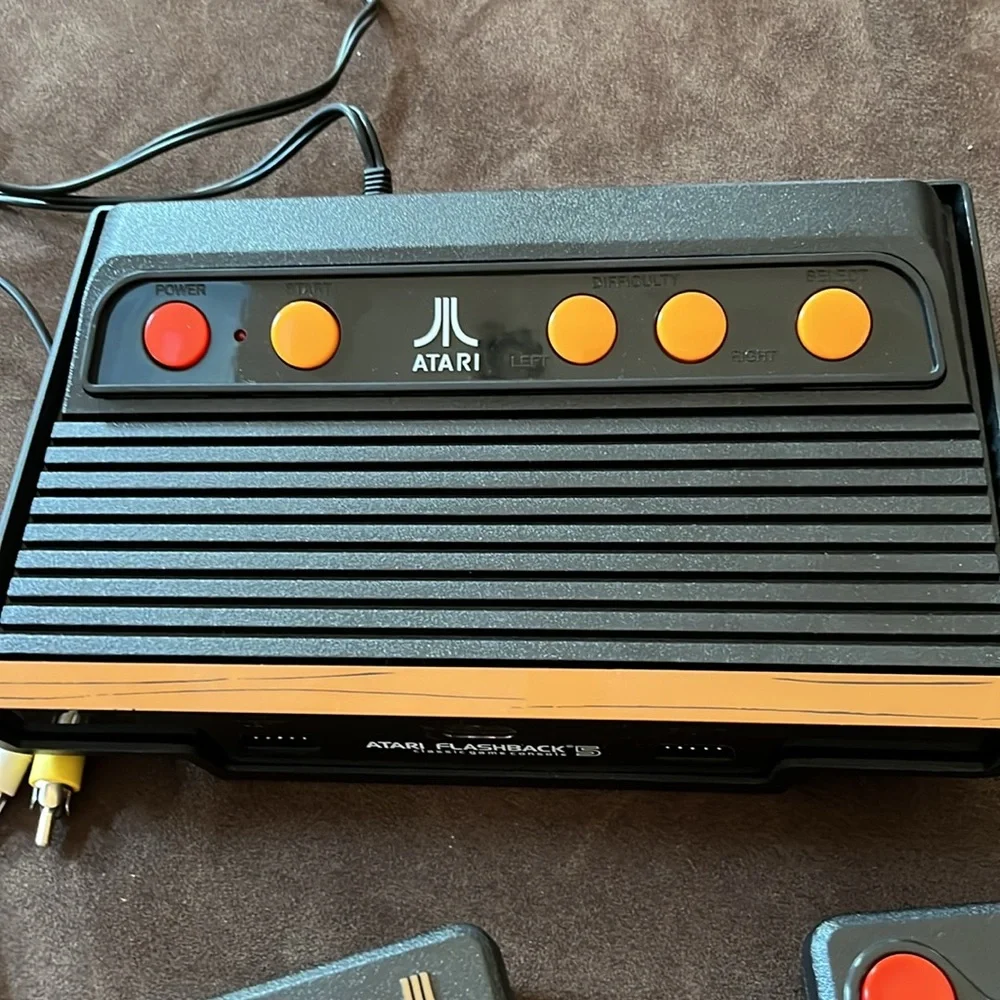 Atari flashback 5 wireless game console and two controllers